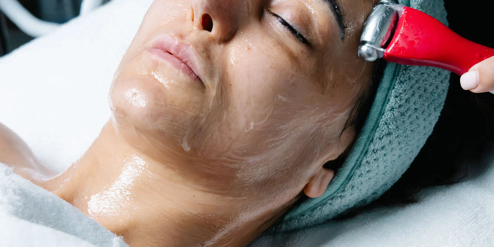 Client receiving a personalized HydraFacial treatment at OC Skin Care Center
