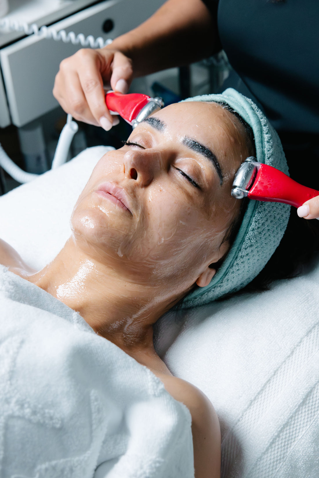 OC Skin Care Center provider performing a customized acne facial