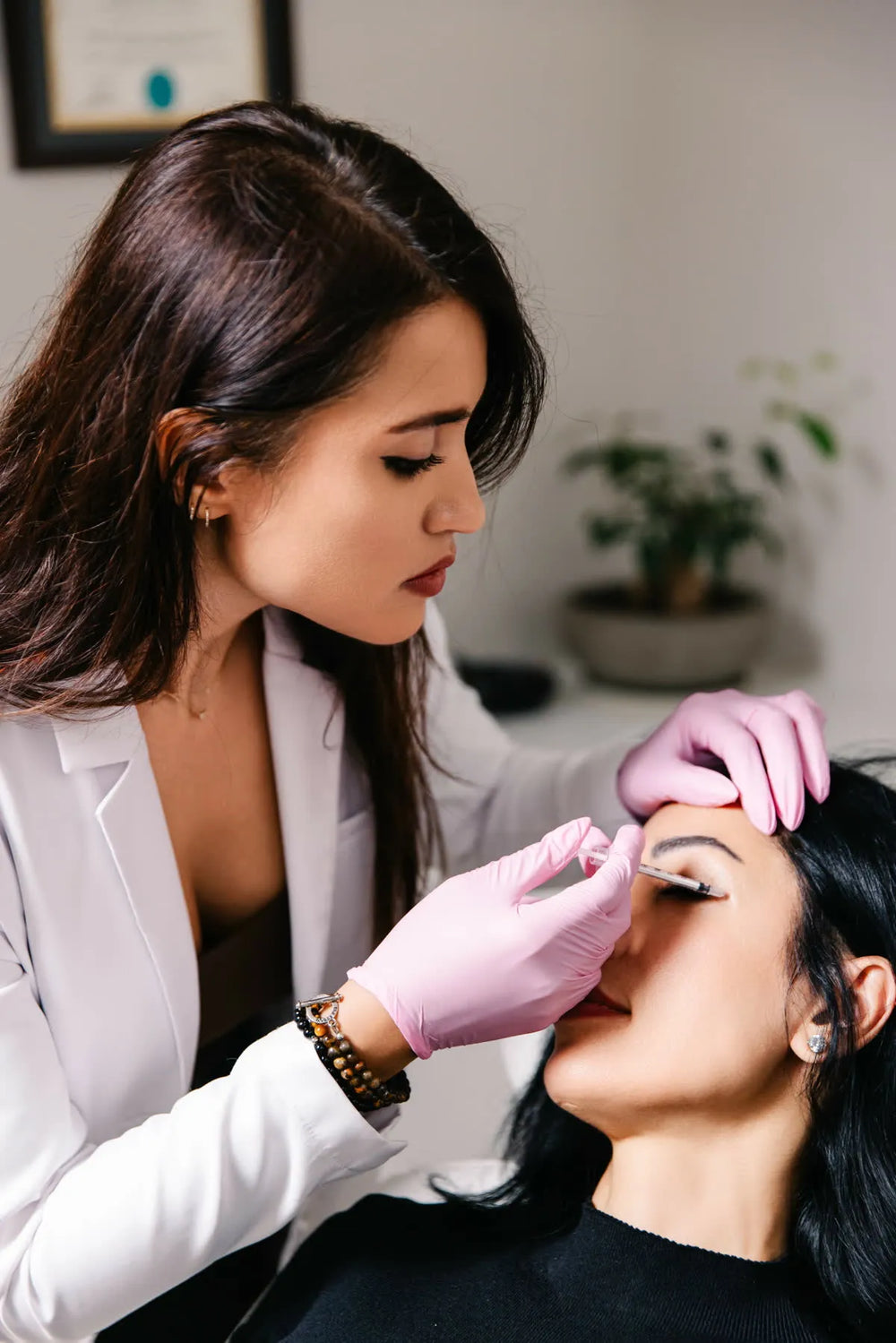 Medical aesthetic treatment in progress at a warm, natural Newport Beach clinic