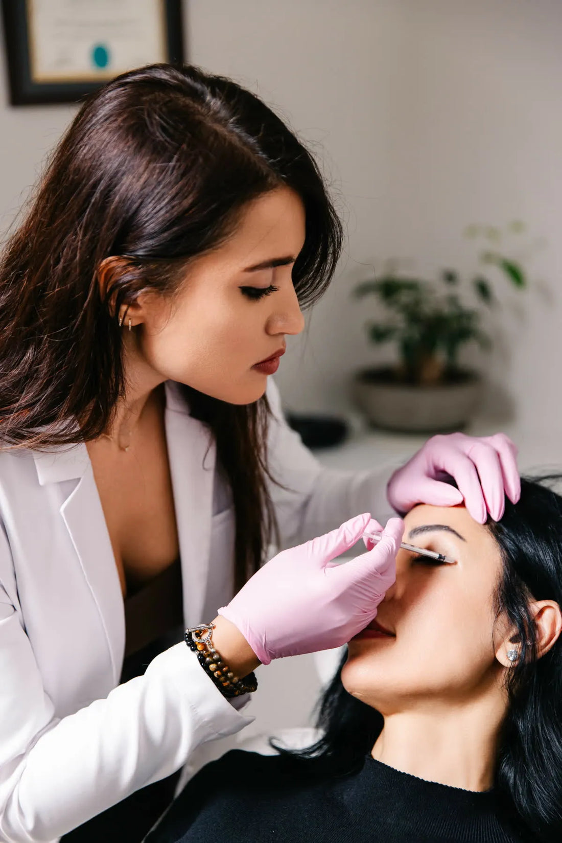 Medical aesthetic treatment in progress at a warm, natural Newport Beach clinic