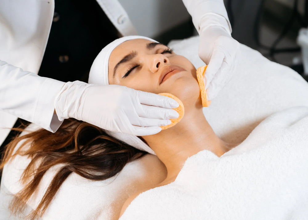 Elevated, natural photography of healthy, radiant skin, aligned with the OC Skin Care Center brand.